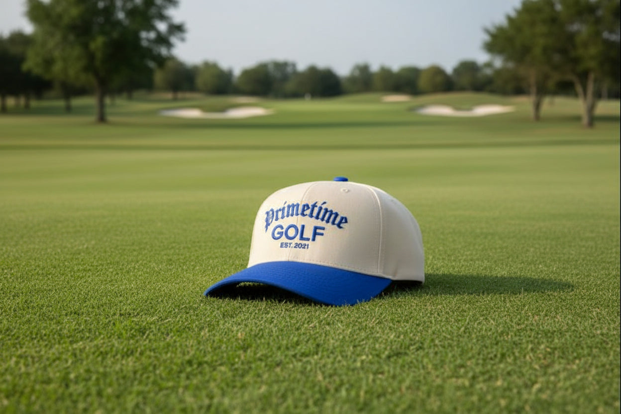 Beige and blue cap with 'Primetime Golf' text on a white background